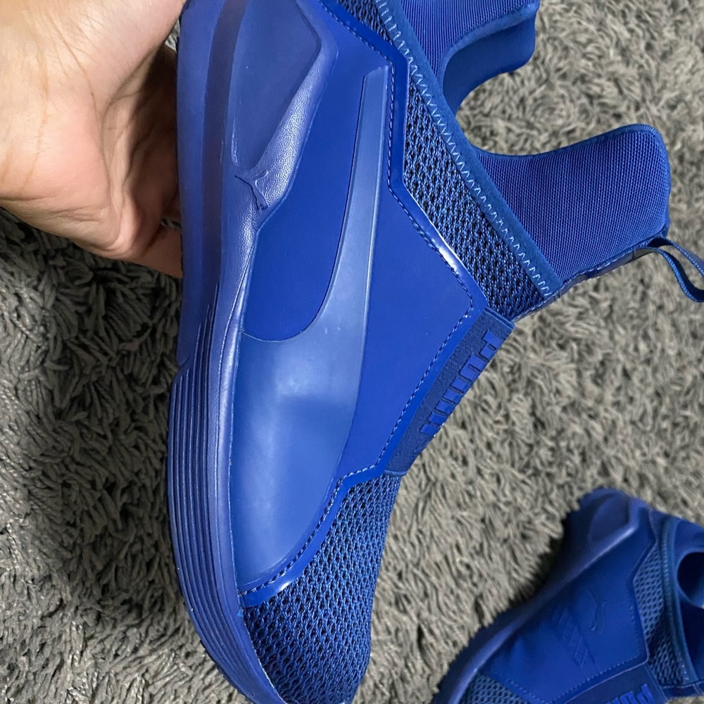 Used Puma sneaker in blue, text me to workout a price